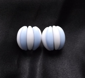 image of a pair of white and pale blue glass bead clip on earrings signed west germany